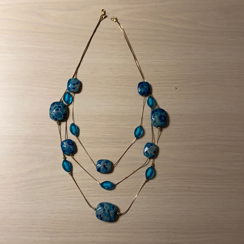 Blue/ Turquoise and golden colored necklace